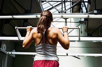 Woman doing pull up