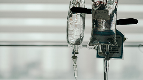 Image of an IV bag full of fluids.