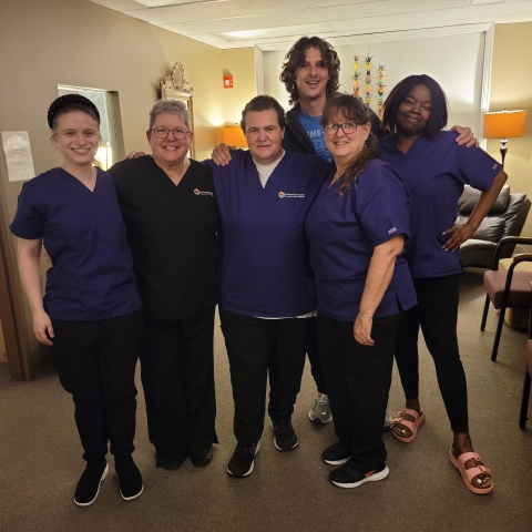 Six students pose for a photo.